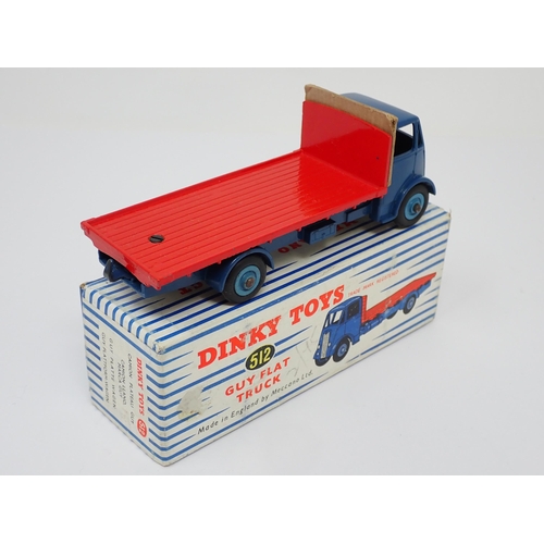 1157 - A boxed Dinky Toys No.512 blue and red Guy Flat Truck