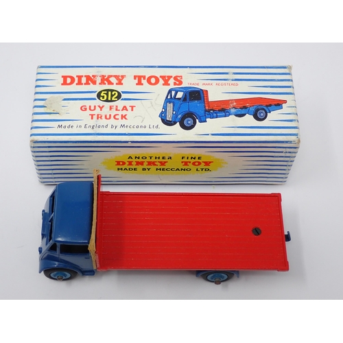 1157 - A boxed Dinky Toys No.512 blue and red Guy Flat Truck