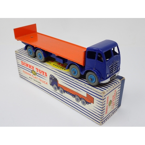 1158 - A boxed Dinky Toys No.903 blue and orange Foden Flat Truck