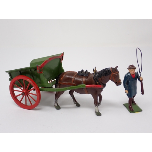 1160 - An unboxed Britains single axle Farm Wagon with Horse and Drover