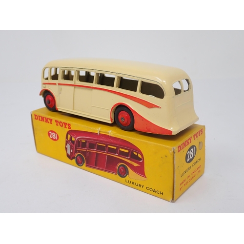 1161 - A boxed Dinky Toys No.281 Luxury Coach in cream livery with red flash