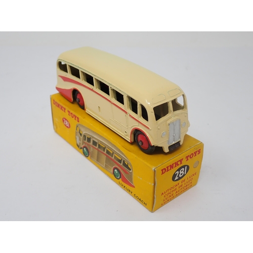 1161 - A boxed Dinky Toys No.281 Luxury Coach in cream livery with red flash