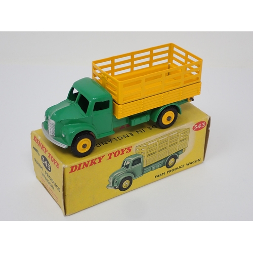 1167 - A boxed Dinky Toys No.343 yellow and green Farm Produce Wagon with plastic hubs