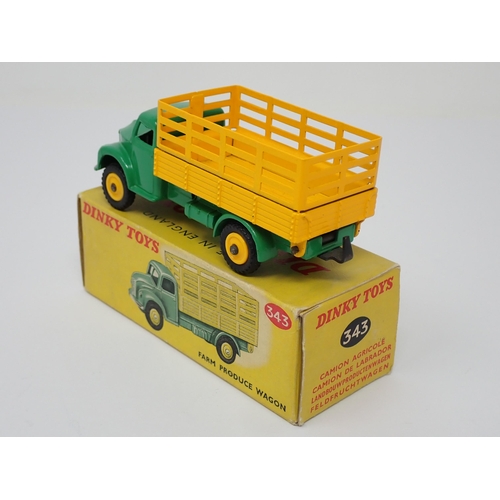 1167 - A boxed Dinky Toys No.343 yellow and green Farm Produce Wagon with plastic hubs