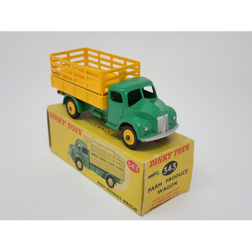 1167 - A boxed Dinky Toys No.343 yellow and green Farm Produce Wagon with plastic hubs