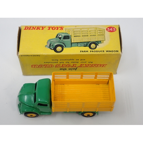 1167 - A boxed Dinky Toys No.343 yellow and green Farm Produce Wagon with plastic hubs