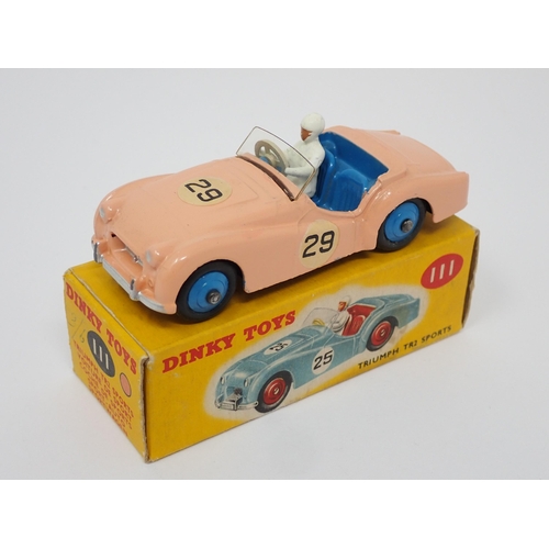 1168 - A boxed Dinky Toys No.111 pink Triumph TR2 Sports