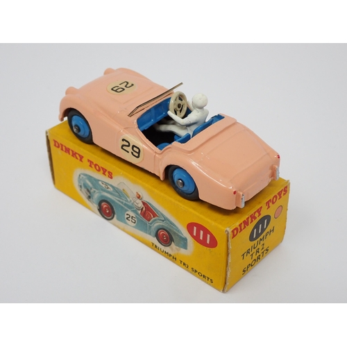 1168 - A boxed Dinky Toys No.111 pink Triumph TR2 Sports