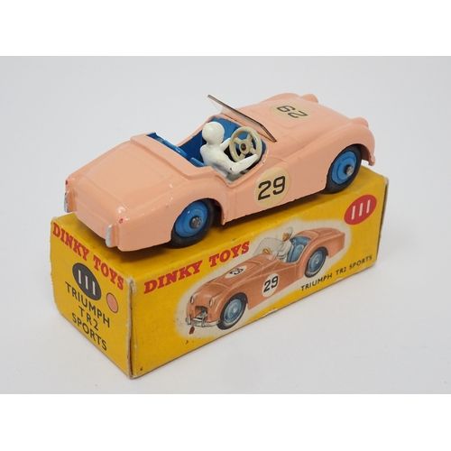 1168 - A boxed Dinky Toys No.111 pink Triumph TR2 Sports