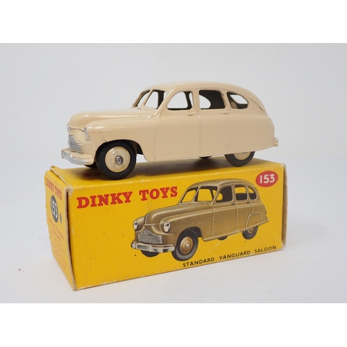 1169 - A boxed Dinky Toys No.153 cream Standard Vanguard Saloon