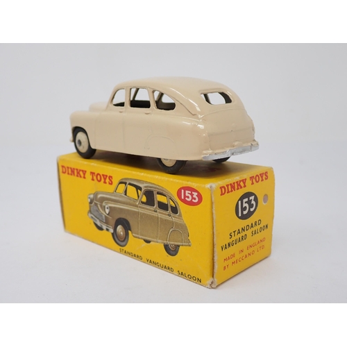 1169 - A boxed Dinky Toys No.153 cream Standard Vanguard Saloon