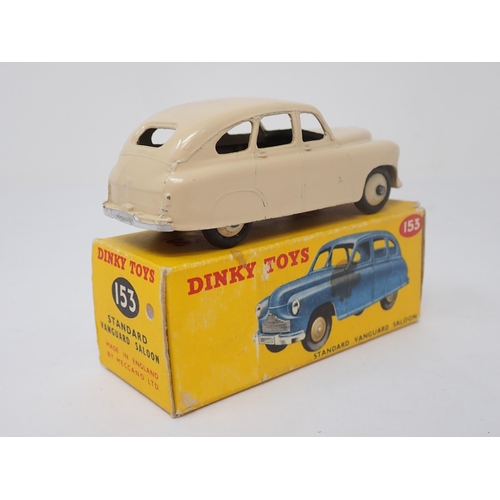 1169 - A boxed Dinky Toys No.153 cream Standard Vanguard Saloon