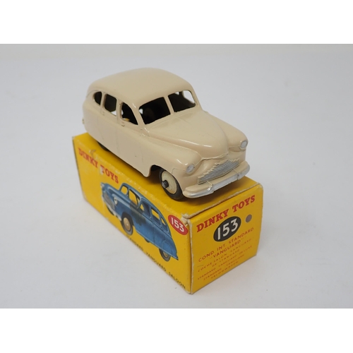 1169 - A boxed Dinky Toys No.153 cream Standard Vanguard Saloon