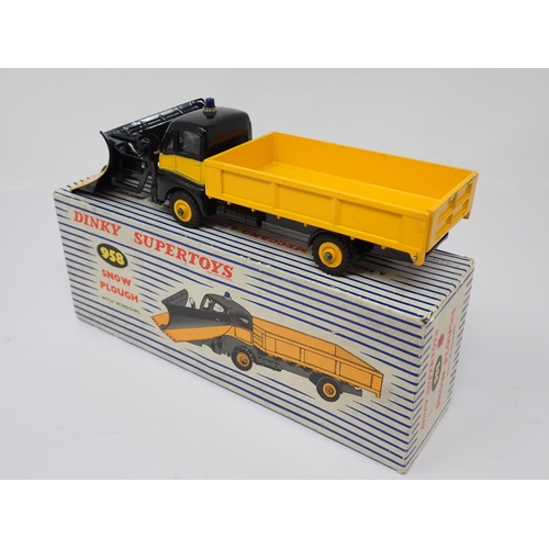 1171 - A boxed Dinky Toys No.958 yellow and black Snow Plough with packing