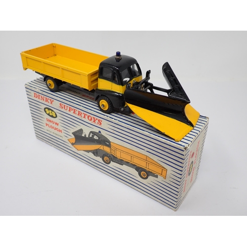 1171 - A boxed Dinky Toys No.958 yellow and black Snow Plough with packing