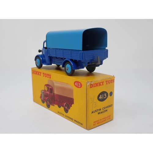 1173 - A boxed Dinky Toys No.413 blue Austin Covered Wagon