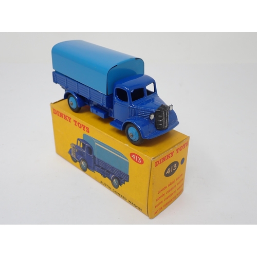 1173 - A boxed Dinky Toys No.413 blue Austin Covered Wagon