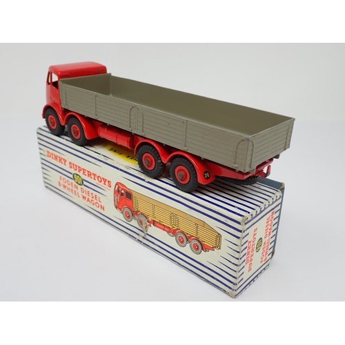 1184 - A boxed Dinky Supertoys No.901 red and grey Foden 8-wheel Wagon