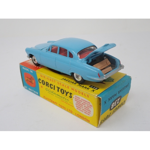 1186 - A boxed Corgi Toys No.238 light blue Jaguar Mark 10 with luggage