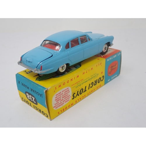 1186 - A boxed Corgi Toys No.238 light blue Jaguar Mark 10 with luggage