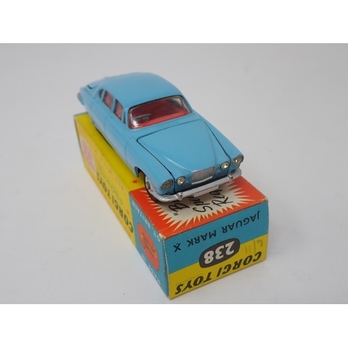 1186 - A boxed Corgi Toys No.238 light blue Jaguar Mark 10 with luggage