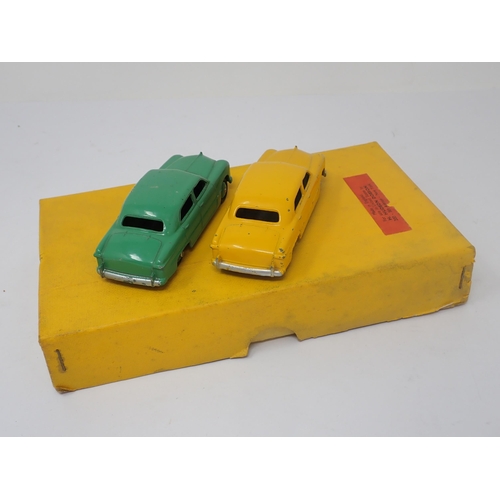 1193 - A Dinky Toys No.139A Trade Box containing two Ford 'Fordor' Sedans with dividers and Hudson Dobson l... 