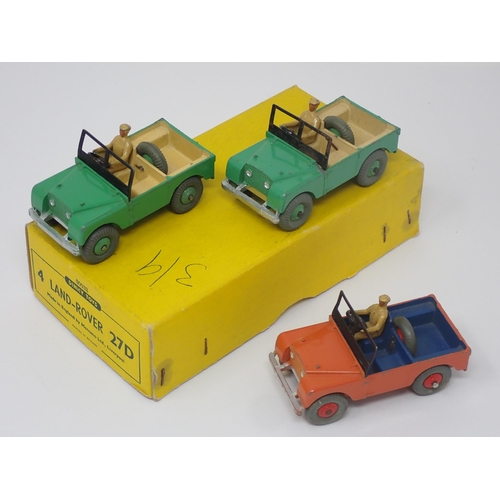 1194 - A Dinky Toys No.27D Trade Box containing three Land Rovers