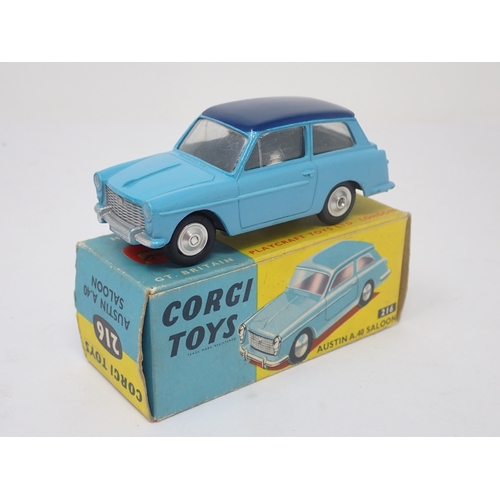 1213 - A boxed Corgi Toys No.216 two tone blue Austin A40 Saloon with dished hubs