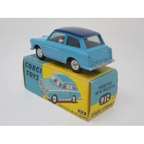 1213 - A boxed Corgi Toys No.216 two tone blue Austin A40 Saloon with dished hubs