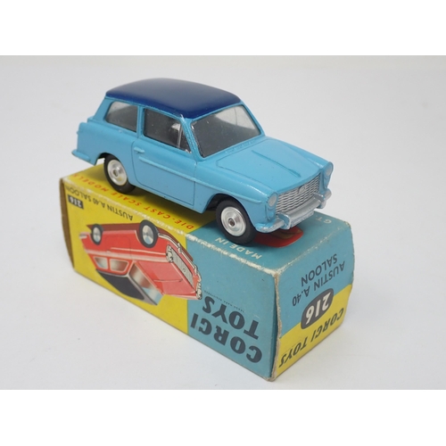 1213 - A boxed Corgi Toys No.216 two tone blue Austin A40 Saloon with dished hubs