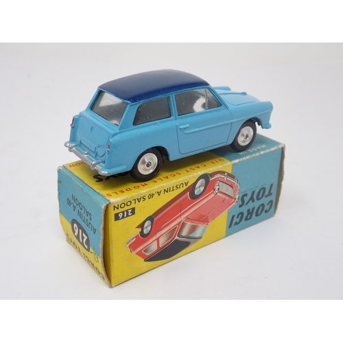 1213 - A boxed Corgi Toys No.216 two tone blue Austin A40 Saloon with dished hubs