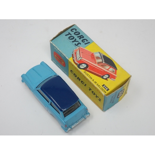 1213 - A boxed Corgi Toys No.216 two tone blue Austin A40 Saloon with dished hubs