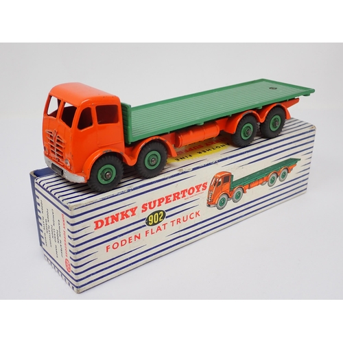 1224 - A boxed Dinky Toys No.902 orange and green Foden Flat Truck