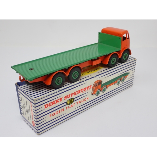 1224 - A boxed Dinky Toys No.902 orange and green Foden Flat Truck