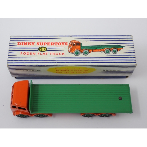 1224 - A boxed Dinky Toys No.902 orange and green Foden Flat Truck