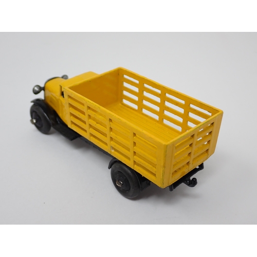 1226 - A Dinky Toys 25F yellow Produce Wagon