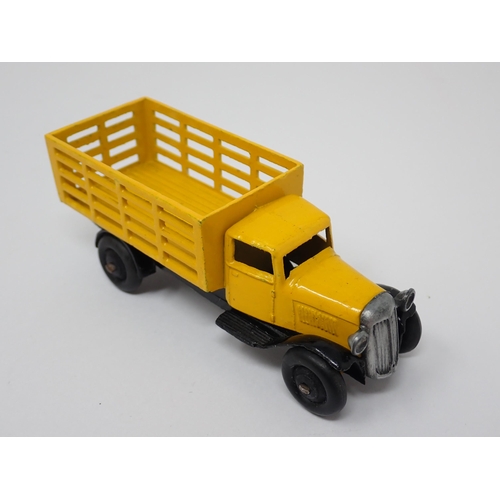 1226 - A Dinky Toys 25F yellow Produce Wagon