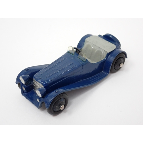 1227 - A Dinky Toys dark blue and grey Jaguar SS100