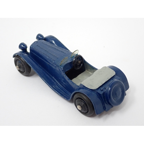 1227 - A Dinky Toys dark blue and grey Jaguar SS100