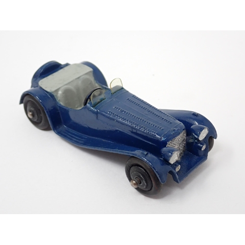 1227 - A Dinky Toys dark blue and grey Jaguar SS100