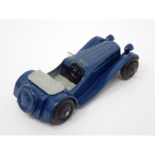 1227 - A Dinky Toys dark blue and grey Jaguar SS100