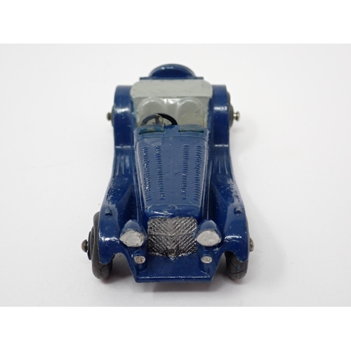 1227 - A Dinky Toys dark blue and grey Jaguar SS100