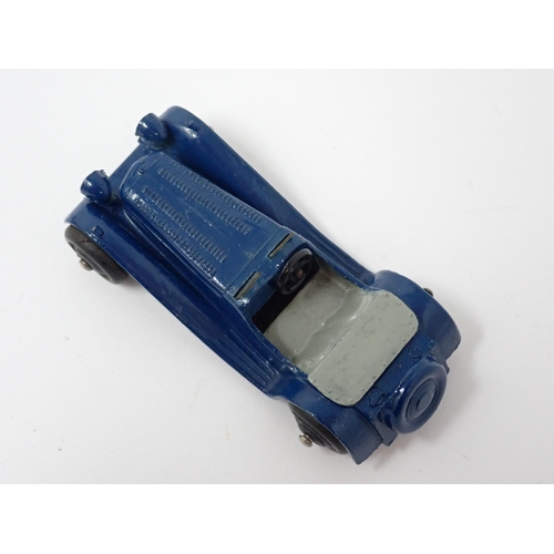 1227 - A Dinky Toys dark blue and grey Jaguar SS100