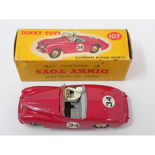 1235 - A boxed Dinky Toys No.107 maroon Sunbeam Alpine Sports