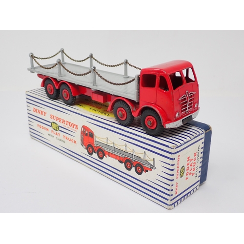 1238 - A boxed Dinky Toys No.905 red and grey Foden Flat Flat Truck with chains