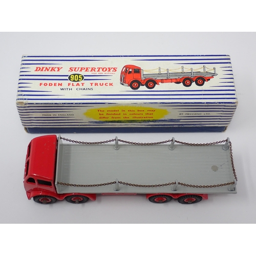 1238 - A boxed Dinky Toys No.905 red and grey Foden Flat Flat Truck with chains