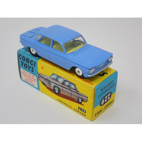 1254 - A boxed Corgi Toys No.229 blue Chevrolet Corvair