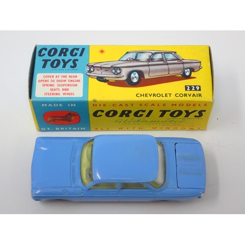 1254 - A boxed Corgi Toys No.229 blue Chevrolet Corvair