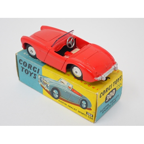 1260 - A boxed Corgi Toys No.300 red Austin Healey Sports