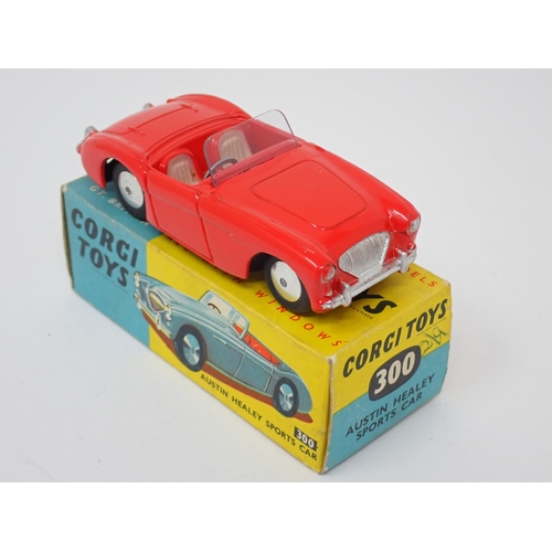 1260 - A boxed Corgi Toys No.300 red Austin Healey Sports